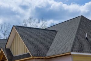 an asphalt shingle roof on a family home